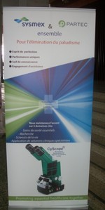 Affiche PARTEC AC bien en vue devant le stand: cliquer pour aggrandir